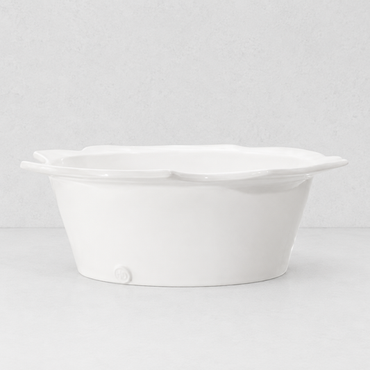 Handmade Montes Doggett ceramic small bowl, creamy white glaze, scalloped rim, 12"Dia x 4.5"H.