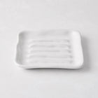 White handmade ceramic soap dish 5270 by Montes Doggett, 5" square with organic shape and multiple ridges.