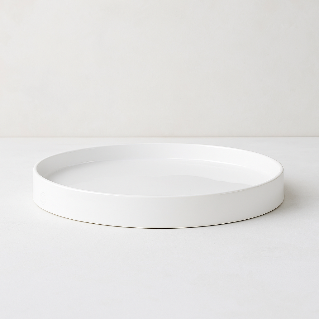 Handmade Montes Doggett ceramic tray, creamy white glaze, 10" round.
