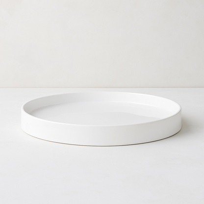 Handmade Montes Doggett ceramic tray, creamy white glaze, 10" round.