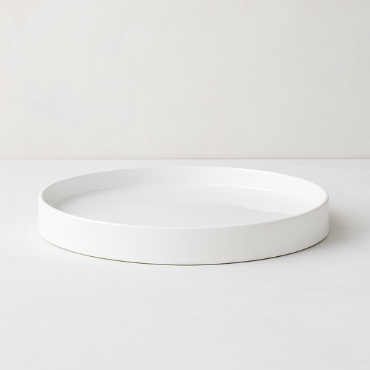 Handmade Montes Doggett ceramic tray, creamy white glaze, 10" round.