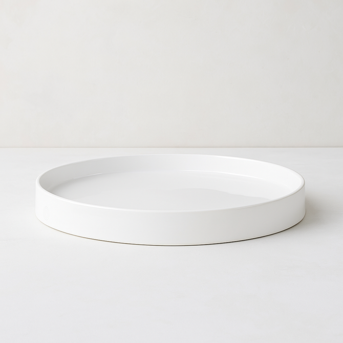 Handmade Montes Doggett ceramic tray, creamy white glaze, 10" round.