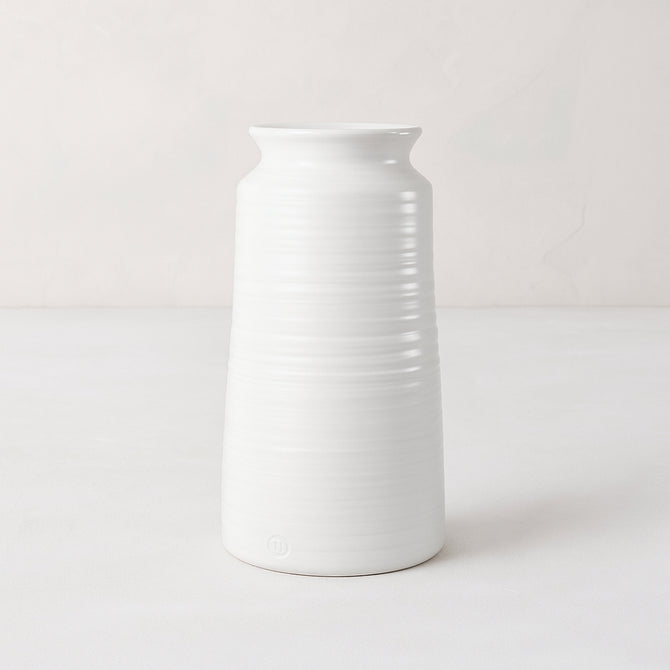 Handmade white ceramic vase 4818 by Montes Doggett, 14"H, with curved edge and horizontal ridges.
