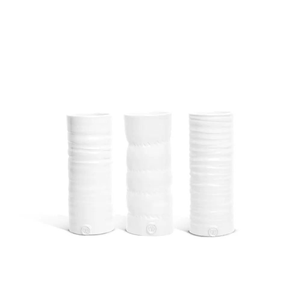 Set of 3 Montes Doggett handmade ceramic vases, creamy white glaze, textured cylindrical design.
