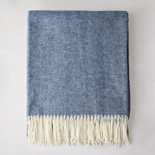 Harbor Blue Italian Herringbone Throw Blanket, 51"x67" cotton-acrylic, with white fringe.