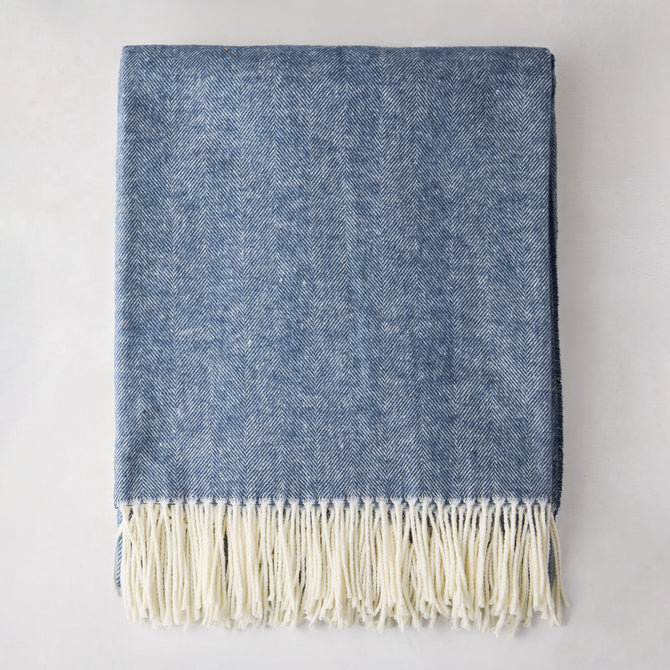 Harbor Blue Italian Herringbone Throw Blanket, 51"x67" cotton-acrylic, with white fringe.