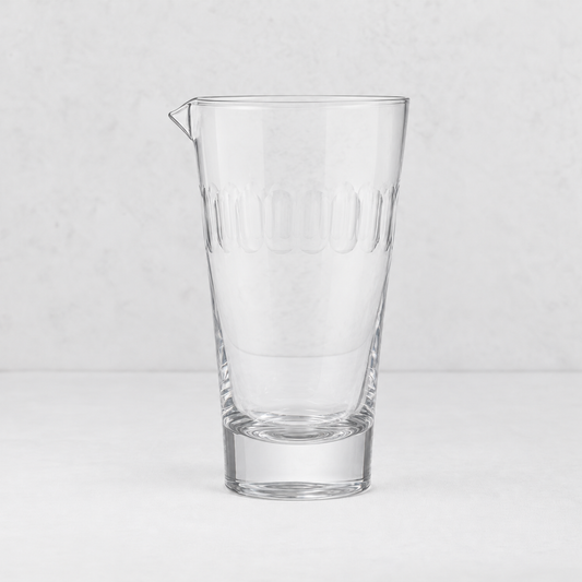 Harrington hand-blown lead-free crystal cocktail mixing glass with hand-cut oval pattern and pouring spout.