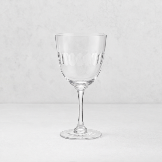 Harrington lead-free crystal white wine glass with hand-cut oval pattern on a clear, elegant stem.