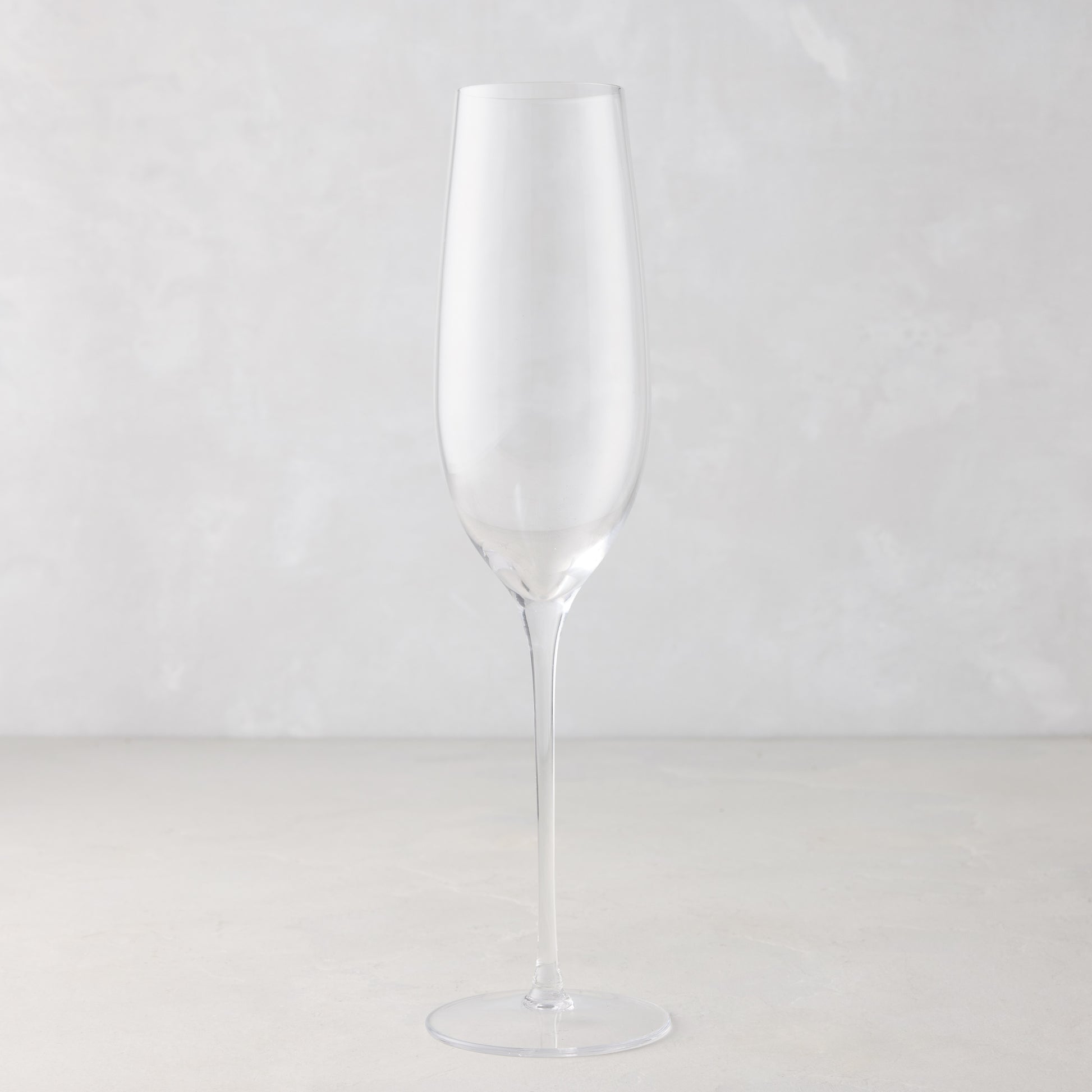 Clear, tall HG Heritage Champagne Glass, mouth-blown glass, 10"H.