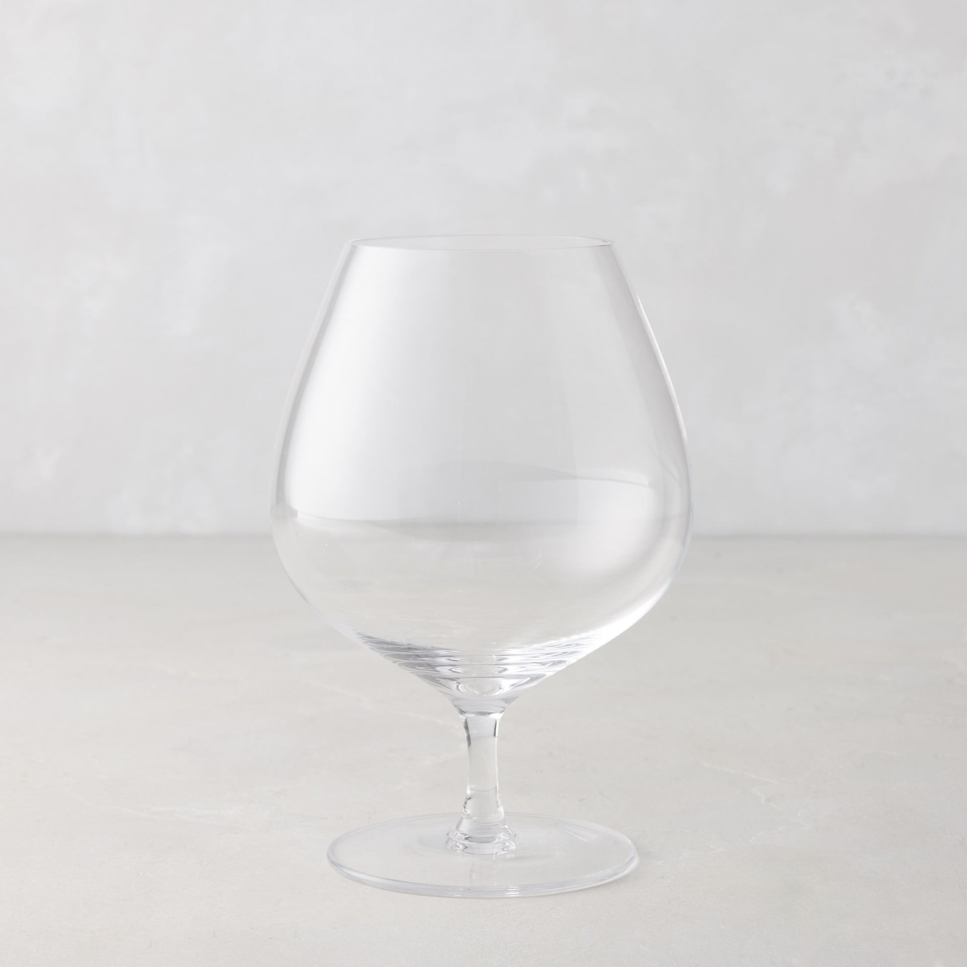 Clear, mouth-blown HG Heritage Cognac Glass with a generous bowl and short stem.