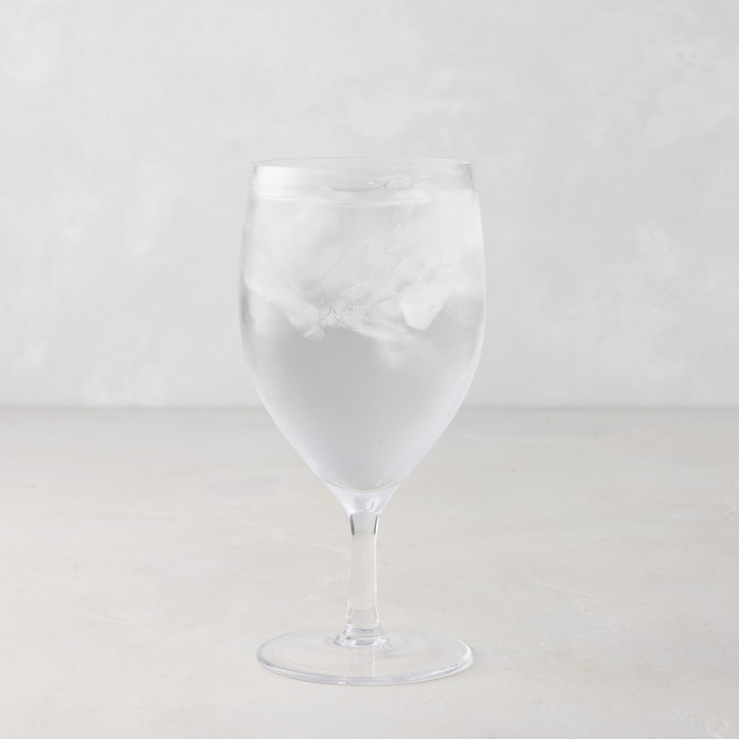 HG Heritage Water Glass, clear mouth-blown glass, 6.3"H x 3"Dia, filled with ice water.