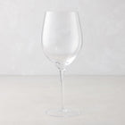 Clear, tall HG Heritage mouth-blown wine glass with a thin stem and wide bowl.