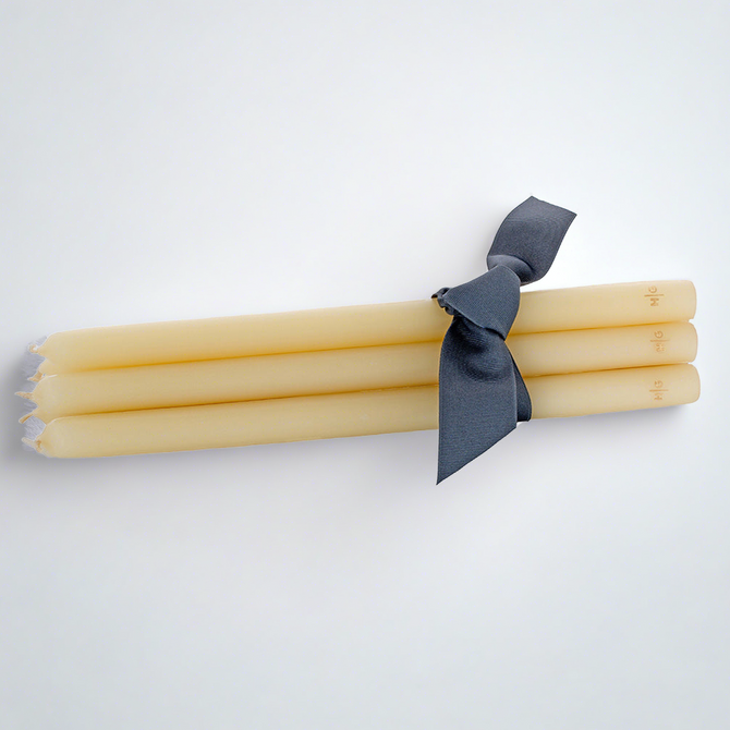 HG Amber Unscented 15" Taper Candle Bundle, Set of 5, tied with a gray ribbon.