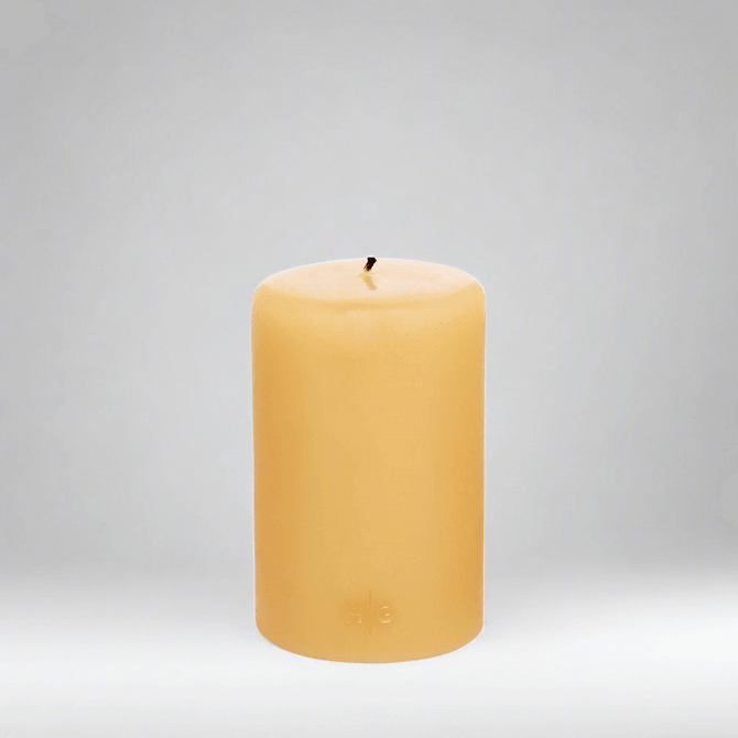 HG Amber Unscented Pillar Candle, 4"x6", with subtle gold HG logo.