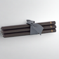 Set of 5 HG Black 17" unscented taper candles, hand-dipped paraffin, tied with a gray ribbon.
