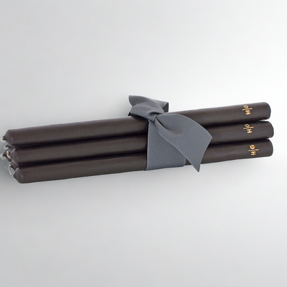 Set of 5 HG Black 17" unscented taper candles, hand-dipped paraffin, tied with a gray ribbon.