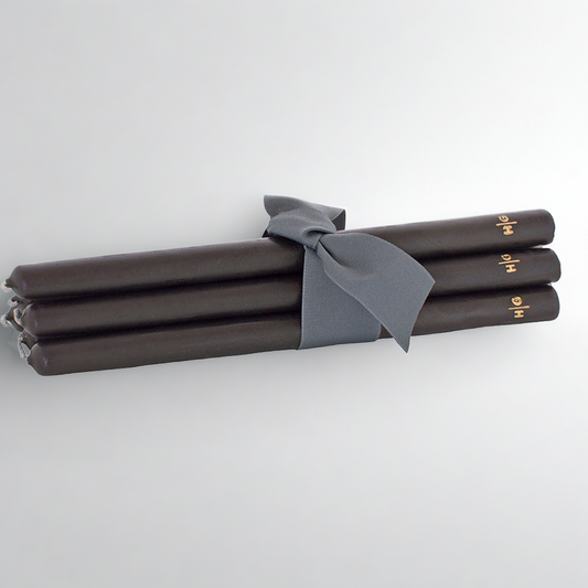 Set of 5 HG Black 17" unscented taper candles, hand-dipped paraffin, tied with a gray ribbon.
