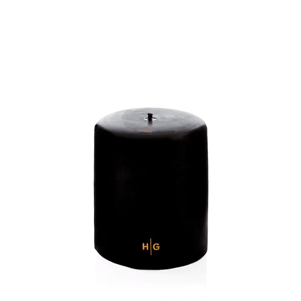 HG Black Unscented Pillar Candle, 5"x6", hand-dipped paraffin with gold HG logo.