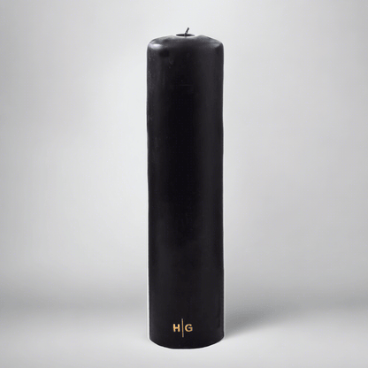 HG Black Unscented Pillar Candle, 3"x12", with gold HG logo and oversized cotton wick.