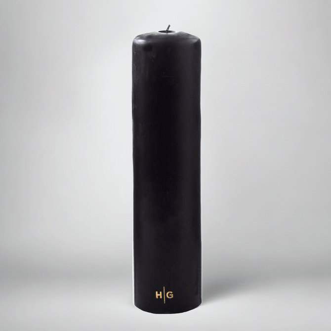 HG Black Unscented Pillar Candle, 3"x12", with gold HG logo and oversized cotton wick.
