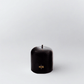 HG Black 3"x3" unscented pillar candle with gold embossed HG logo and oversized cotton wick.