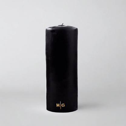 HG Black Unscented Pillar Candle, 3"x8", with gold embossed HG logo.