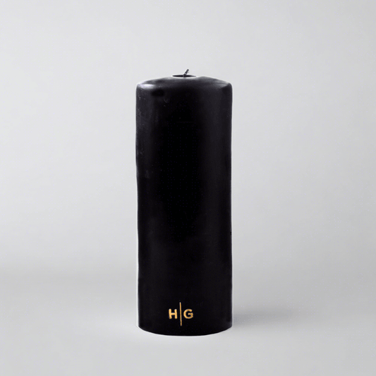 HG Black Unscented Pillar Candle, 3"x8", with gold embossed HG logo.