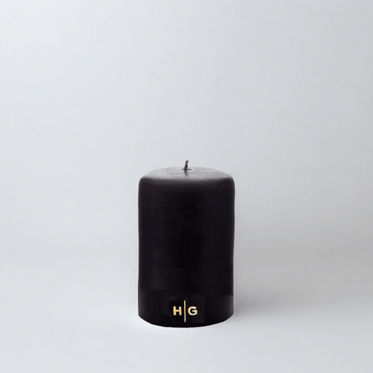 HG Black Unscented Pillar Candle, 3"x4", with gold HG logo, oversized cotton wick.