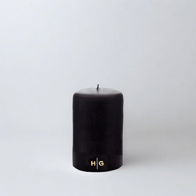 HG Black Unscented Pillar Candle, 3"x4", with gold HG logo, oversized cotton wick.