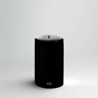 HG Black Unscented Pillar Candle, 4"x6", with gold HG logo.