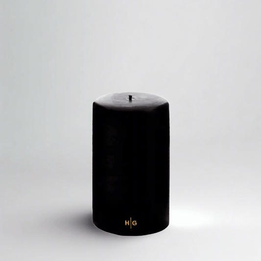 HG Black Unscented Pillar Candle, 4"x6", with gold HG logo.