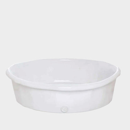 HG Handmade Ceramic Round Baking Dish, creamy white glaze, 11"Dia, by Montes Doggett.
