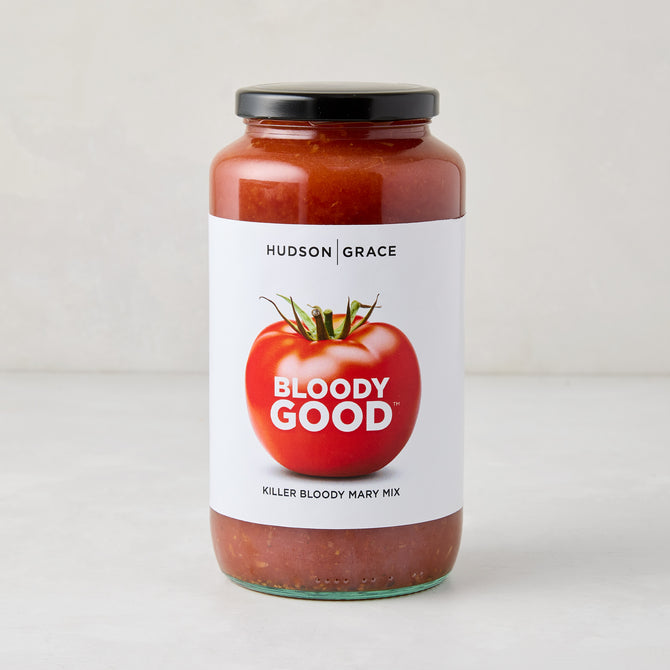 Hudson Grace Bloody Good Killer Bloody Mary Mix in a clear glass jar with a black lid.