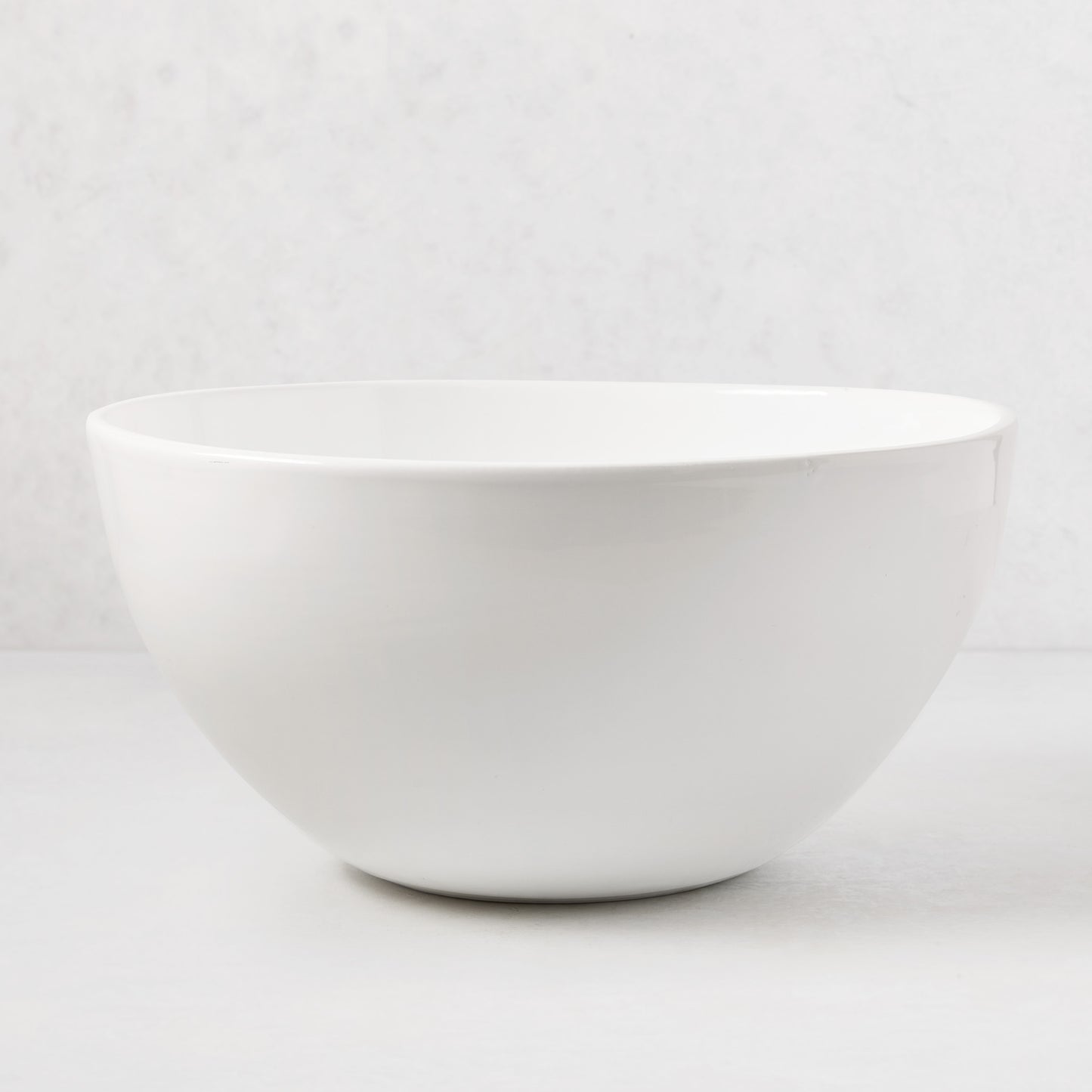 White, modern 14" ceramic serve bowl from Hudson Grace, sleek and simple.