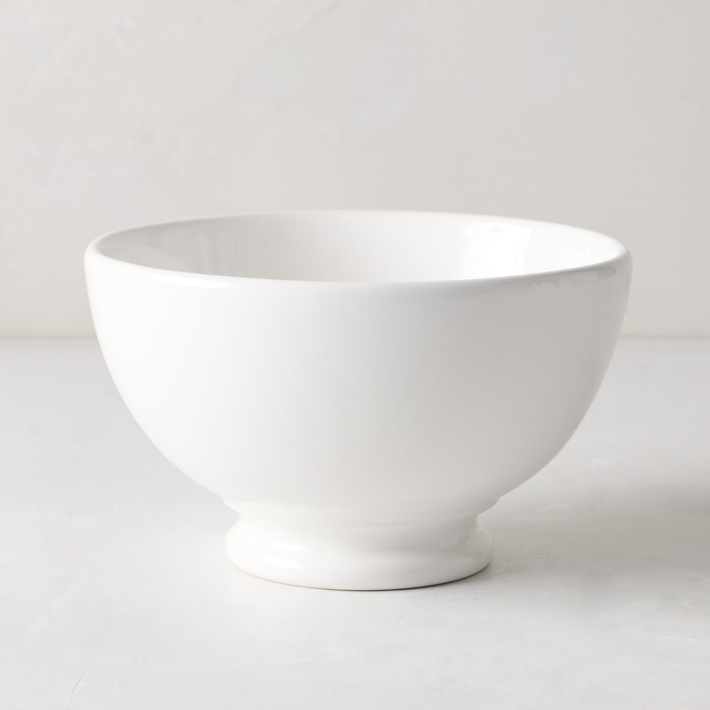 HG Original creamy white ceramic footed bowl, 6.5" diameter, rounded shape.