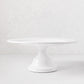 HG Original Medium Pedestal Cake Stand, creamy white ceramic, 13" diameter, 5.5" H, classic European style.
