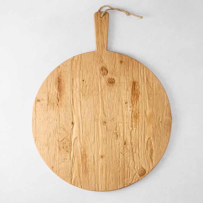 Round reclaimed wood serving board with handle and rope, natural light brown finish, 19.5" diameter.