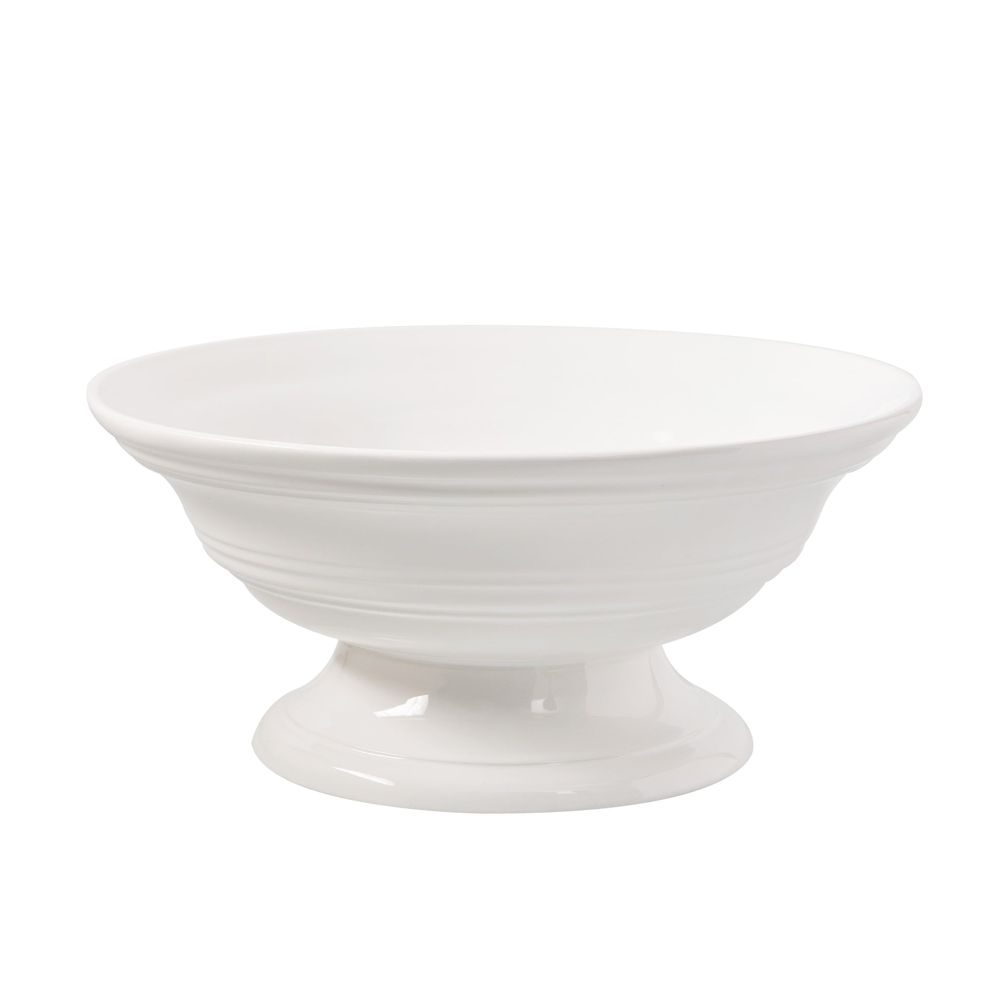 White ceramic footed bowl, 11.5" round, with horizontal ridges.