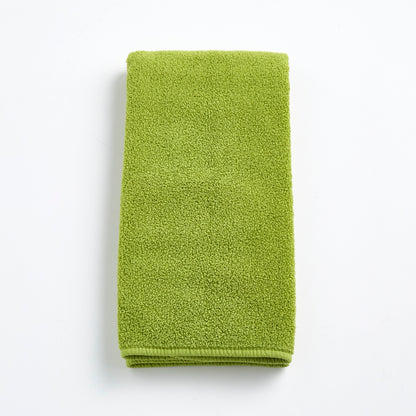 HG Signature aloe green zero twist cotton hand towel, 20x30 inches, with matching bias piping.