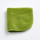 Aloe green 12-inch square zero-twist cotton terry washcloth with matching bias piping.