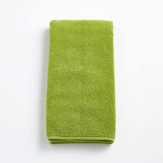 HG Signature aloe green zero twist cotton hand towel, 20x30 inches, with matching bias piping.