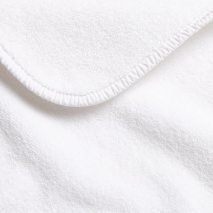 Cloud white Signature bath towel with a soft, plush cotton texture and a neatly finished stitched hem.