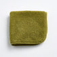 Olive green 12-inch square washcloth made of zero-twist cotton terry with matching cotton bias piping.