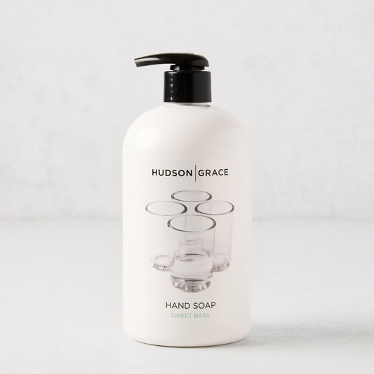 White HG Sweet Basil Hand Soap, 16 oz, with black pump and clear glass graphic.