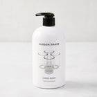 Hudson Grace Tart Kumquat Hand Soap, 16 oz, white bottle with black pump and glass graphic.