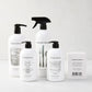 White Hudson Grace Tart Kumquat cleaning gift set: dish soap, hand soap, hand lotion, surface cleaner, and kitchen candle.