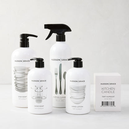 White Hudson Grace Tart Kumquat cleaning gift set: dish soap, hand soap, hand lotion, surface cleaner, and kitchen candle.
