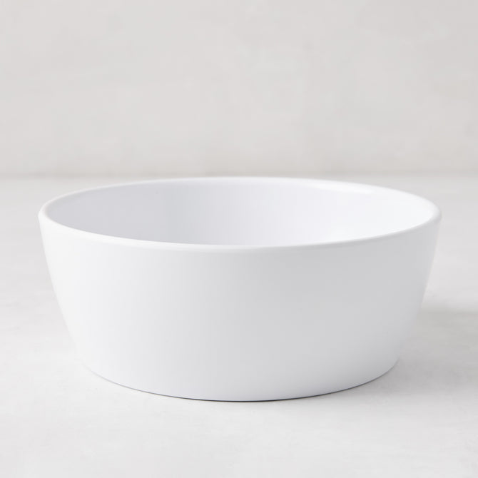 HG White Melamine Bowl, 6.75"Dia x 2.5"H, with a modern lipped design.