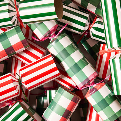 HG Holiday Gingham Christmas Crackers in red, green, and white stripes and plaid patterns.