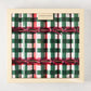 Hudson Grace Holiday Gingham Christmas Crackers, red and green plaid, tied with pink ribbon, in a beige box.